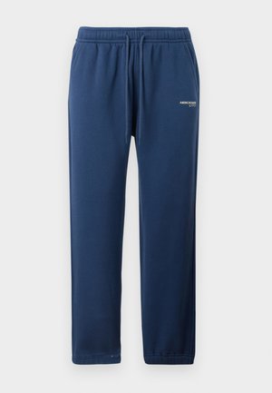 Granatowe dresy z elastycznym pasem, sznurkiem, kieszeniami bocznymi oraz małym logo Abercrombie & Fitch na lewym udzie.