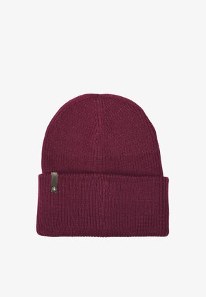Burgundy knit beanie with a folded cuff and ribbed texture, featuring a small metallic logo tag on the side.
