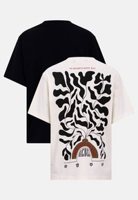 Short-sleeve t-shirt with a black back. Front features a white base with a bold abstract black design, red text, and graphic accents.