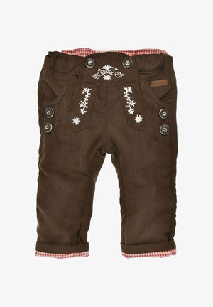 Braune Stoffhosen mit weißer Blumenstickerei, zwei Seitenknöpfen und einem rot-weiß karierten Innenfutter an den Bündchen.