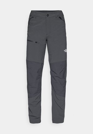 Harmaat ulkoiluhousut, joissa on sileä pinta, sivussa vetoketjullinen tasku, vahvistetut polviosiot ja huomaamaton logo-ominaisuus.