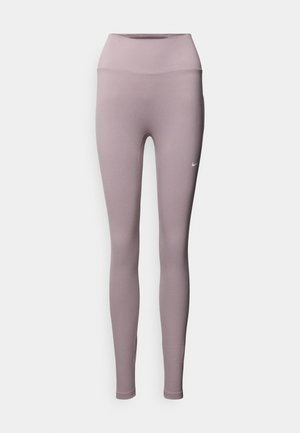 Leggings met hoge taille en aansluitende pasvorm in licht mauve stof. Voorzien van platte naden en een klein wit logo op het linkerbeen.