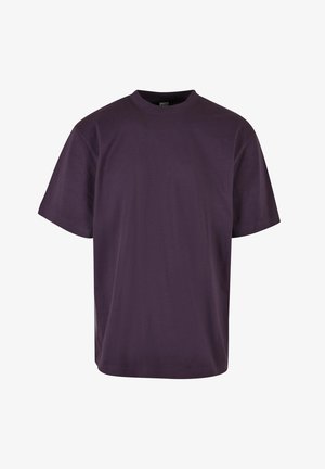 Lilla bomulds t-shirt, korte ærmer, rund hals, afslappet pasform, glat tekstur, ingen mønstre eller detaljer.