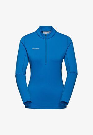 Blå fleece halv-zip pullover med lange ærmer. Blød tekstur, elastiske manchetter og et lille logo på brystet. Letvægtsdesign til aktiv brug.
