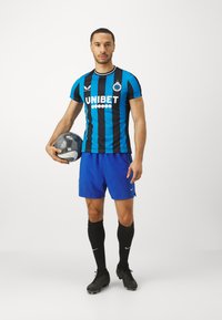 Castore CLUB BRUGGE HOME - Fußball-Trikot - caviar/brugge blue