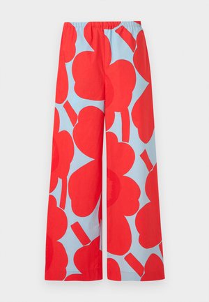 Wide-leg pants with large red apple shapes on a light blue background, featuring an elastic waistband.