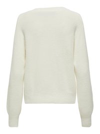 Cream-colored, soft-textured pullover sweater with a rounded neckline and long sleeves, featuring ribbed cuffs and hem.