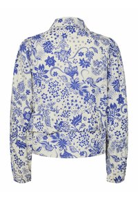 Blommig blus med blå mönster på en krämfärgad bakgrund, långa ärmar, krage och en volangdetalj vid midjan.