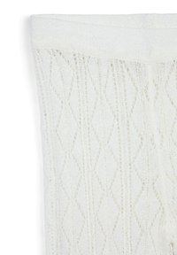 Leggings di maglia color crema chiaro con motivo a diamante, dotati di un elastico a costine in vita e di una finitura testurizzata. Materiale morbido e leggero.