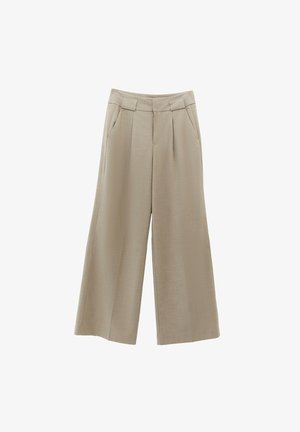 Pantalons larges beige en tissu texturé, avec des plis à l'avant et des poches latérales, taille ajustée pour un bon ajustement et une belle drape.