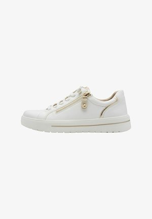 White low-top sneaker with gold zipper and detailing, lace-up front, and thick rubber sole.