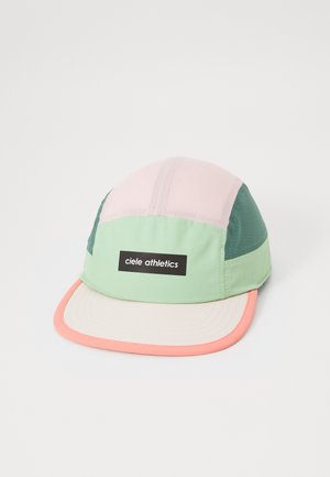 Multicolored cap featuring a mix of pink, green, and teal panels, with a cream brim and a black logo patch on the front.