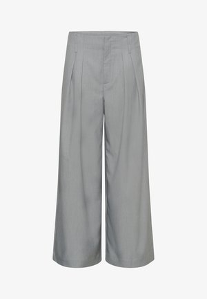 Lichtgrijze wijde broek met plooien aan de voorkant, riemlussen en een ritssluiting aan de voorkant.