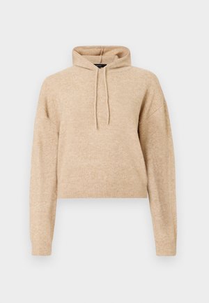 Sudadera de punto recortada en color beige, con mangas largas y capucha con cordón, presentada sobre un fondo blanco.