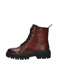 Bottines en cuir marron à lacets avec une finition texturée, dotées d'une semelle noire épaisse et robuste, de lacets noirs et d'une languette sur le talon.
