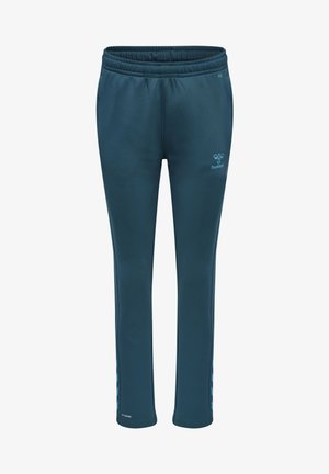 Donker blauwgroene sportbroek met een elastische tailleband, een gladde textuur en zijkanten in een lichtere tint. Bevat een logo nabij de heup.