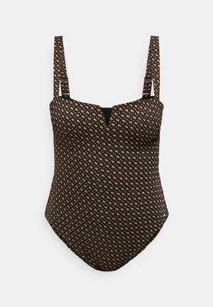 Must mustriga, millel on tekstureeritud muster väikestest pruunidest teemantidest, laiad rihmad ja V-kujuline kaelus. Sile kangas.