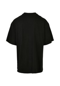 Zwarte katoen t-shirt met korte mouwen, ronde hals en een ontspannen pasvorm. De stof lijkt glad met minimale ontwerpelementen.