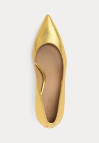 Metallic gold pointed-toe flat with a smooth texture, featuring a cut-out side detail and beige interior, branded insoles visible.