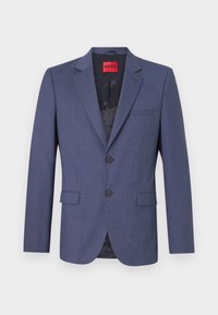 Blazer azul marino de tejido suave con un diseño estructurado, que cuenta con dos bolsillos frontales y un cierre de un solo botón. Etiquetado en el interior.