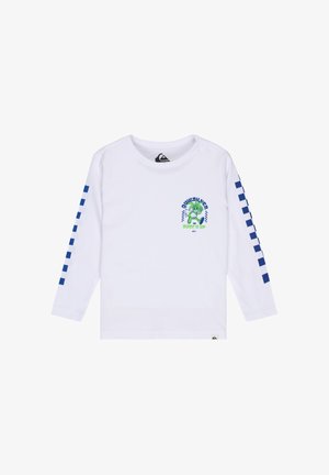 Witte longsleeve met blauw geruite strepen op de mouwen en een groene cartoonafbeelding met tekst "Quiksilver Surf's Up" op de borst.