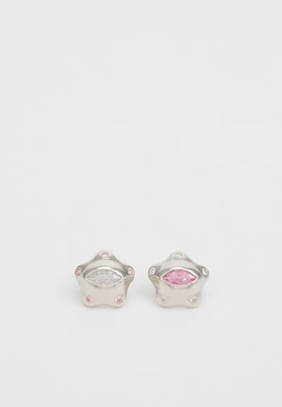 Silver star-shaped earrings with pink and clear gemstones set in a smooth metal surface, featuring six small accent stones.