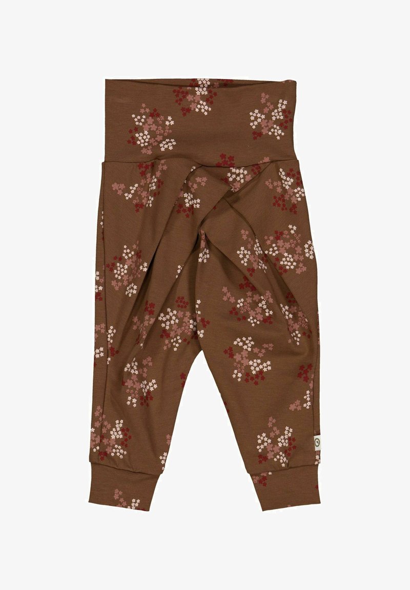 Brązowe spodnie z materiału z kwiatowym wzorem w odcieniach różu i bieli. Projekt zawiera wysoki pas oraz zwężane mankiety, co tworzy efekt zmarszczenia.