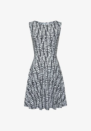 Hame dress sleeveless dengan bodice yang pas dan rok mengembang. Memiliki pola daun hitam dan putih pada kain dengan tekstur.