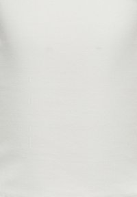 Débardeur en coton blanc avec une texture côtelée et une coupe ajustée. Aucun motif ni accent visible, offrant une apparence simple et minimaliste.