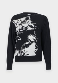 Μαύρο πουλόβερ με μεγάλο λευκό γραφικό μιας γάτας που φορά στρογγυλά γυαλιά και κοιτάζει προς τα αριστερά στο εμπρόσθιο μέρος.