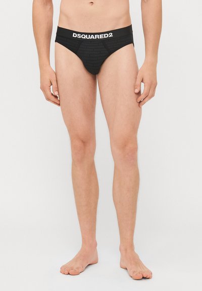 Boxers noirs DSQUARED2 pour hommes avec une ceinture logotée, présentant une texture lisse et une coupe basse, conçus pour le confort et le soutien.