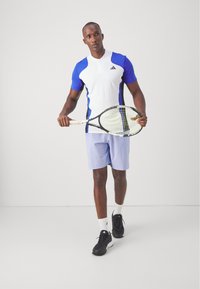 adidas Performance TENNIS ERGO - Sports shorts - blue spark