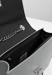 Anna Field Axelremsväska - light blue