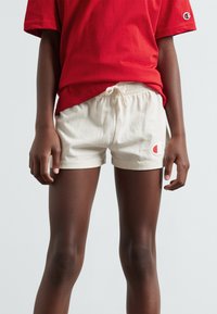 Champion ICONS WITH LARGE LOGO UNISEX - Tracksuit bottoms - sand