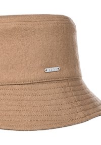Brun uld bucket hat med bred skygge, med vandret syninger og et lille sølvmærke med teksten "ROXY."