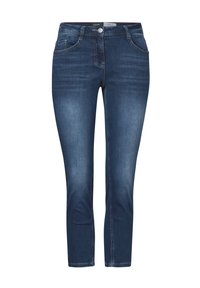 Pantalones vaqueros de denim azul oscuro con corte slim, que presentan bolsillos delanteros, cremallera y cierre de botón. Costuras de contraste visibles a lo largo de las costuras.