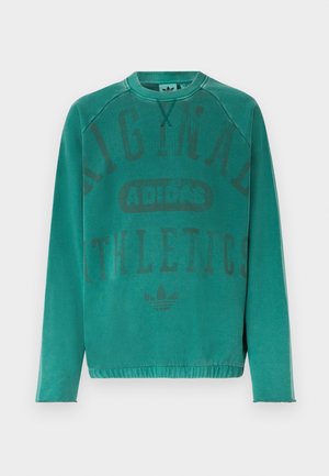 Tirkīzzils garroku krekls ar apaļu apkakli, uz kura priekšpuses ir uzdrukāts teksts "Original Athletics Adidas" un logo.