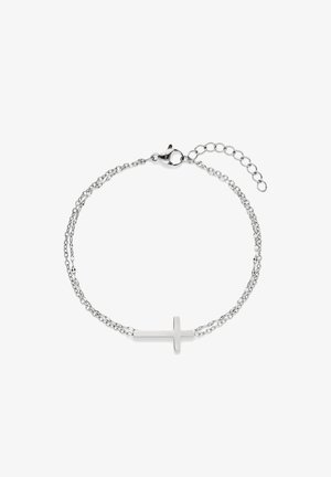 Bracelet à double chaîne en argent avec un pendentif horizontal en forme de croix et un fermoir réglable en forme de homard sur fond blanc.