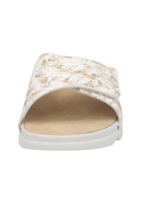 Slide sandal with a white patterned upper featuring abstract gold accents, open toe design, and a beige cushioned insole on a white sole.