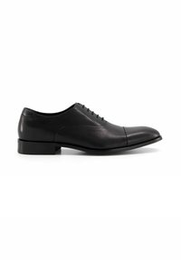 Black leather dress shoe with a smooth texture, rounded toe, subtle stitching detail, and a low, square heel. Minimalist design.