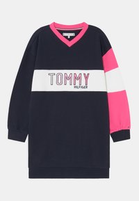 Námořnické mikinové šaty s růžovým v�ýstřihem do V, bílými a růžovými horizontálními pruhy a vyšitým logem "TOMMY HILFIGER" v kontrastních barvách.