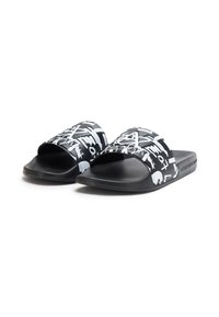 Black slide sandals with a graphic white pattern across the straps. The soles are flat, smooth, and made of a matte rubber material.