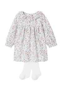 Langärmliges weißes Babykleid mit floralem Muster in Pink, Orange und Blau, mit Rüschensaum, kombiniert mit einfarbigen weißen Strumpfhosen.