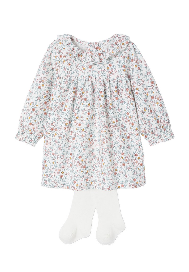 Langärmliges weißes Babykleid mit floralem Muster in Pink, Orange und Blau, mit Rüschensaum, kombiniert mit einfarbigen weißen Strumpfhosen.