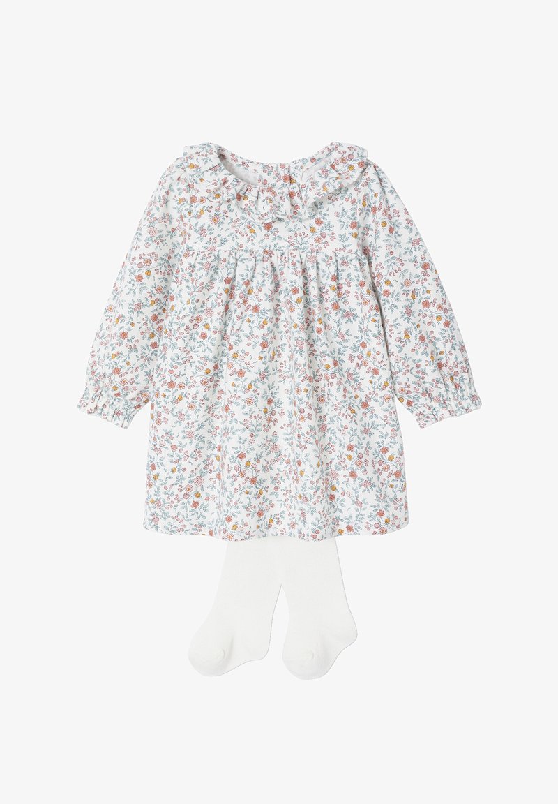 Langärmliges weißes Babykleid mit floralem Muster in Pink, Orange und Blau, mit Rüschensaum, kombiniert mit einfarbigen weißen Strumpfhosen.