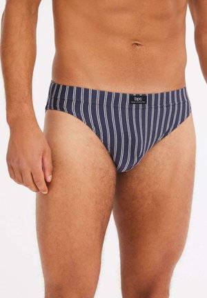 Marineblaue Badebriefer mit weißen Streifen; elastischer Bund; glattes Material; enganliegendes Design; Logofähnchen an der Vorderseite sichtbar.