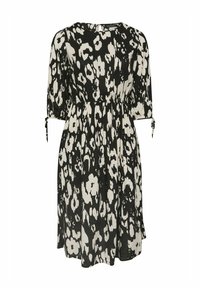 Svart och vit leopardmönstrad klänning med rund halsringning, trekvartsärmar, elastisk midja och knutdetaljer vid ärmarna. Mjuk tyg.