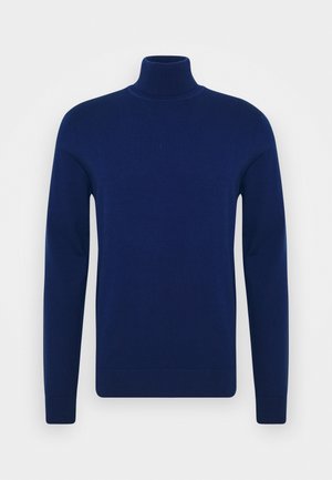 Granatowy sweter typu golf wykonanego z gładkiego dzianiny. Długie rękawy i dopasowany krój z prążkowanymi akcentami u kołnierza i na dolnym brzegu.