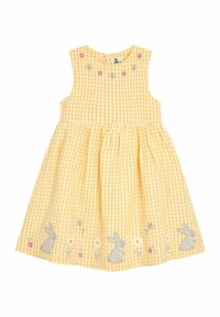 Keltainen ruudullinen mekko, jossa on olkaimeton muotoilu. Mekossa on brodeerattuja pupuja, kukkia ja kerätty helma. Pehmeä kangas, jossa on tekstuuripinta.