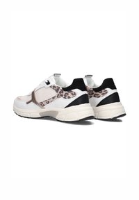 White and black sports shoes with a mesh upper, featuring a leopard print accent. Thick sole with a textured surface and padded collar.